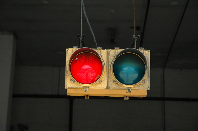 Parking signal suspended on a cable
