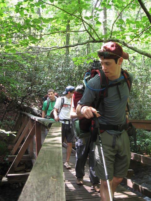 The team crosses the stream