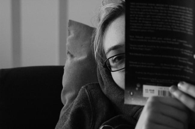 Kristin is on to my game as she reads a book