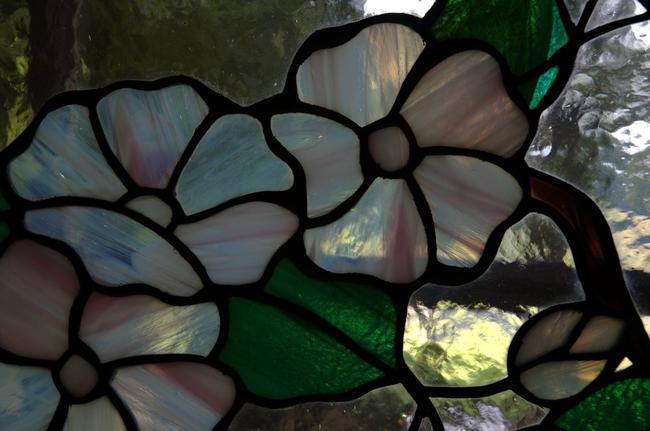 Stained glass leading to the back deck of the house