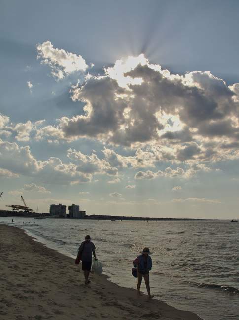 Taking the stroll home after relaxing on the beach.