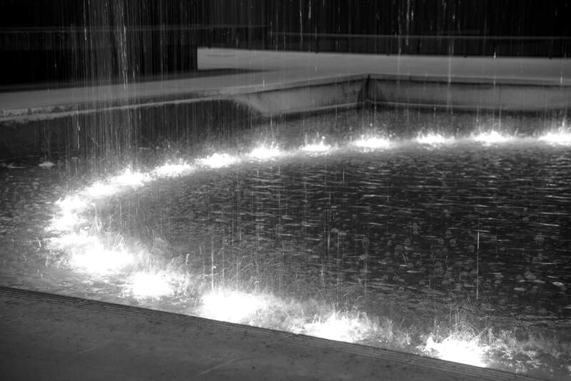 The waterfall hits the reservoir below